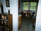 bookshelf and kitchen table